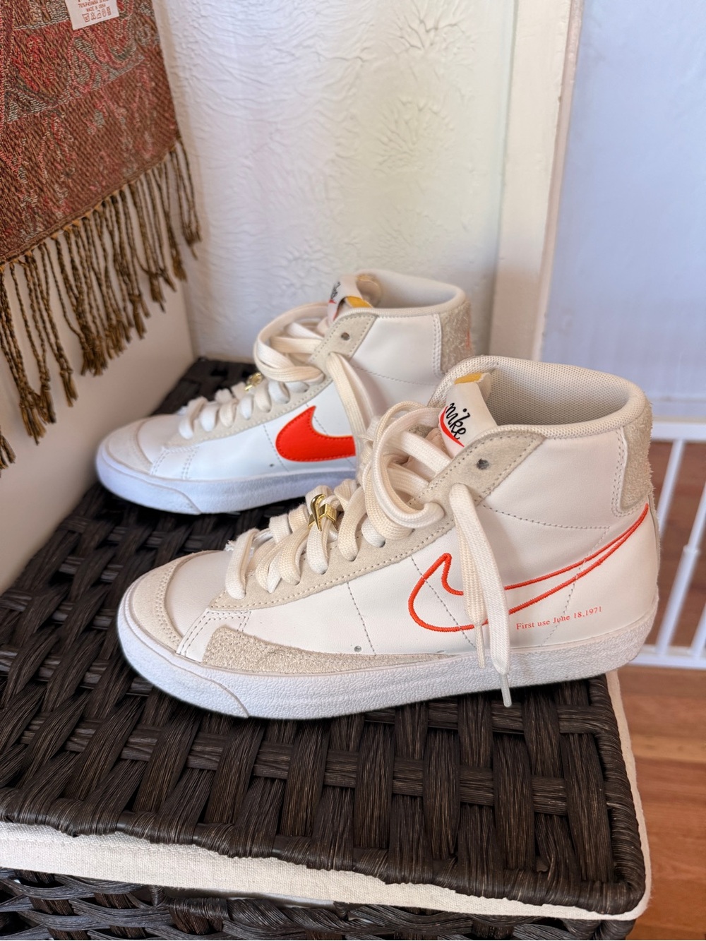 Nike Women's High-Top Sneakers in Cream with Orange Swoosh Accents